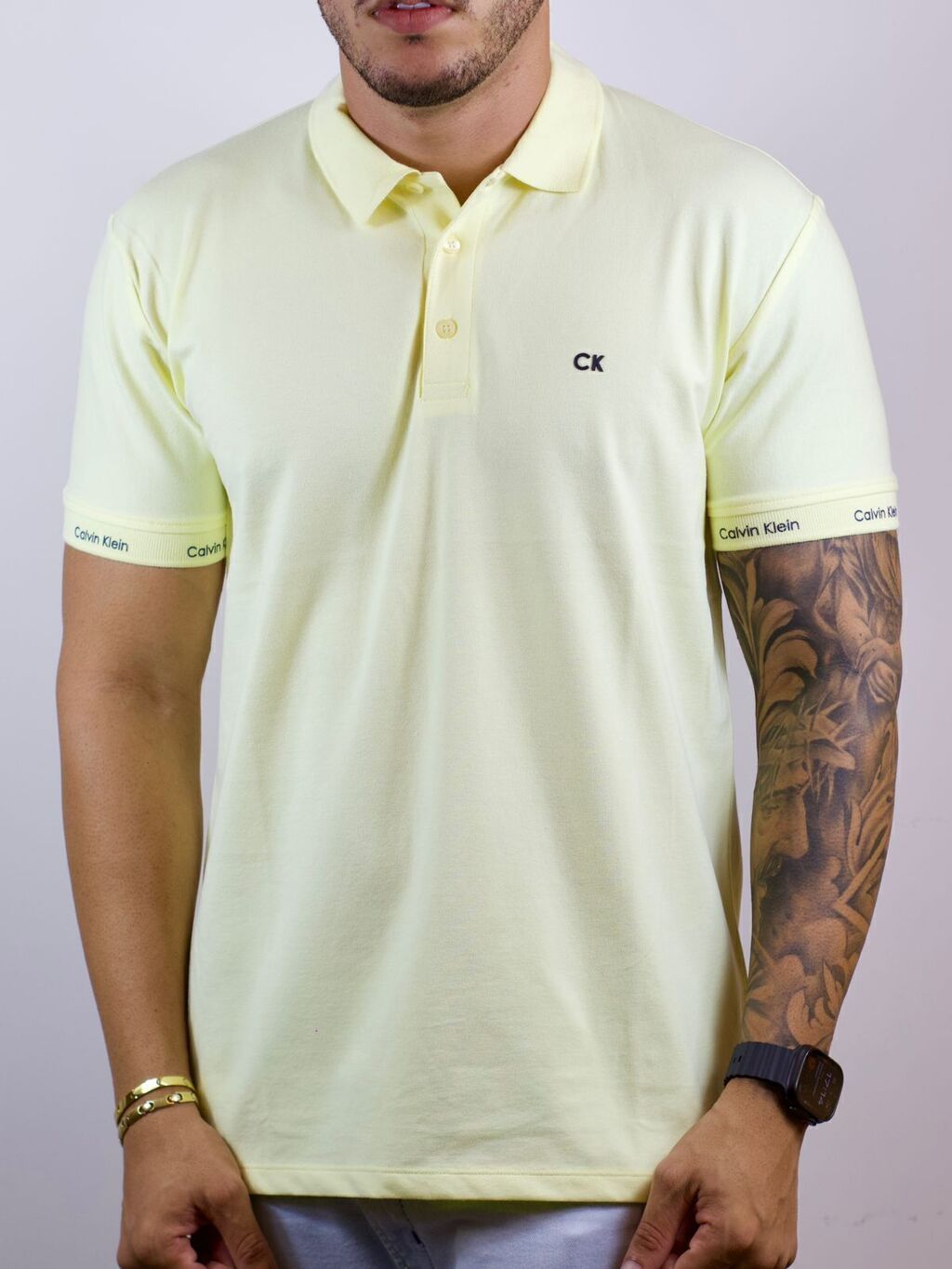 photo-2026-03-25-21-24-14-3-80487c1a391307d74217745479352340-1024-1024 Polo Calvin Klein - Exclusiva Amarelo P - Imagem 1